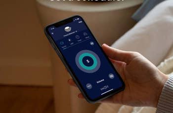model using the app on smartphone to control the white noise machine