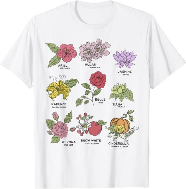 A white t-shirt with illustrated flowers to represent each of the Disney princesses 