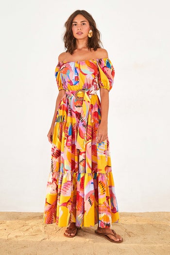 model wearing the macaw-print maxi dress