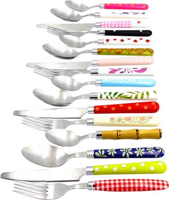 Assorted patterned cutlery sets including forks, knives, and spoons
