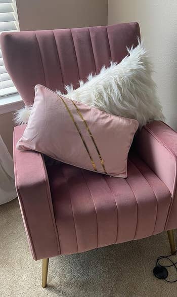reviewer image of the pink throw pillow cover