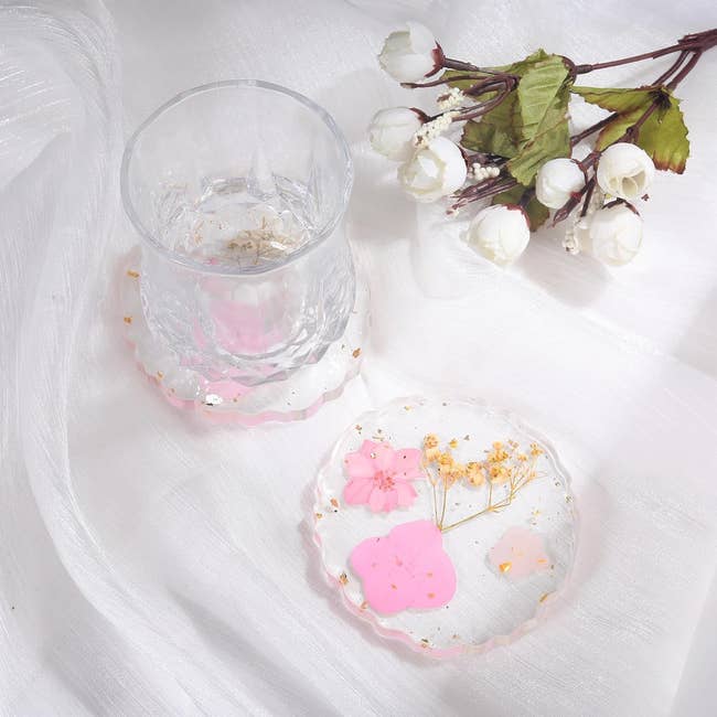 pressed pink flowers in acrylic coasters