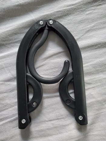 Reviewer photo of the hanger completely folded in