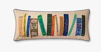 Rectangular pillow with embroidered classical  publication  spines, including 