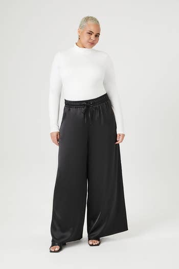 model wearing pants in black