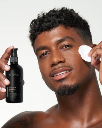 A model holding the toner bottle with a cotton pad to their face