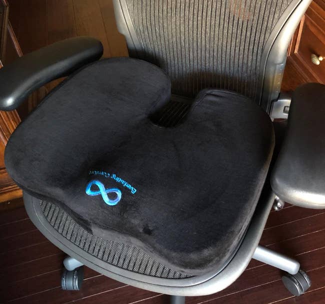 Reviewer's seat cushion on office chair