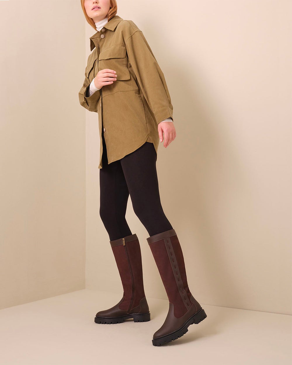 model wearing the brown boots
