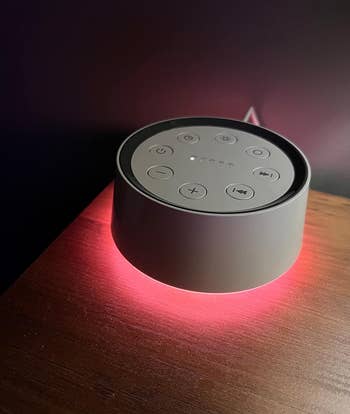 reviewer image of the sound machine emitting a red light