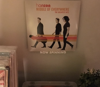 white vinyl shelf that reads 