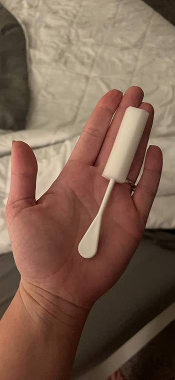 A manus holds a dripstick