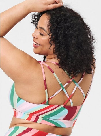 model showing off bra's strappy back