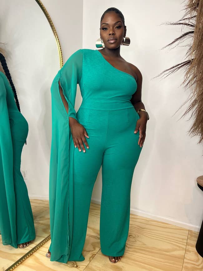 model wearing the teal green jumpsuit