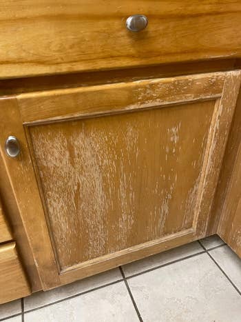 Wooden room furniture showing deterioration and peeling