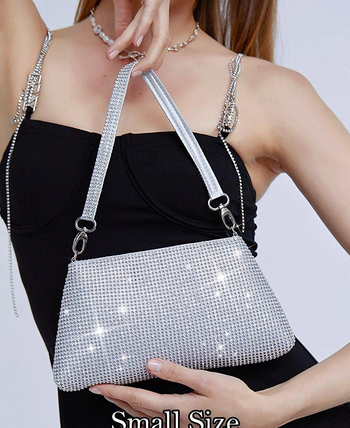 model holding silver sparkly purse