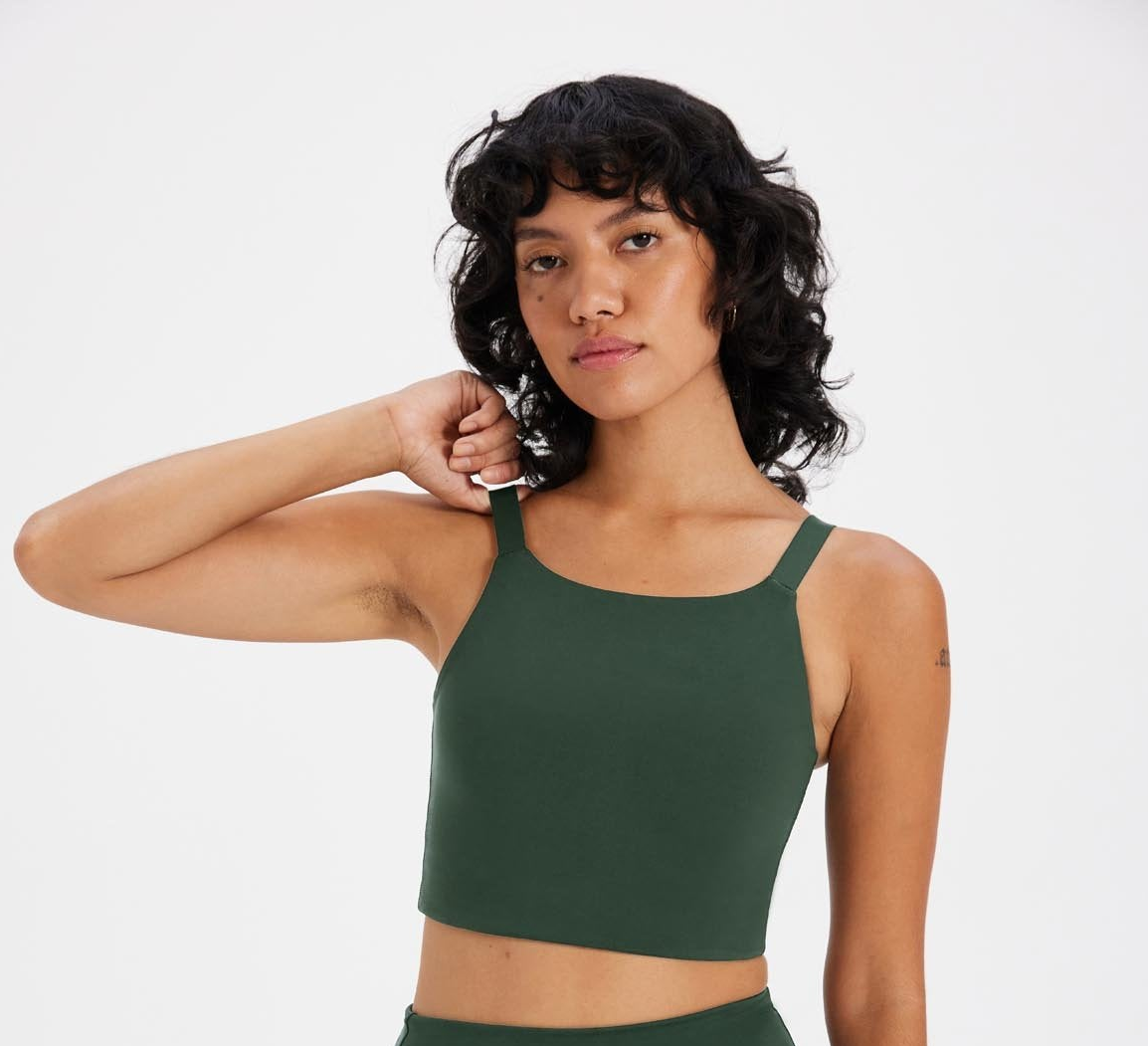 model wearing the bra in green