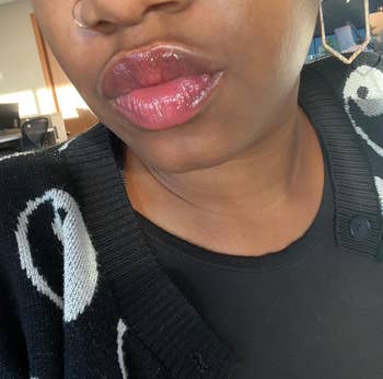 image of a reviewer wearing the lip oil