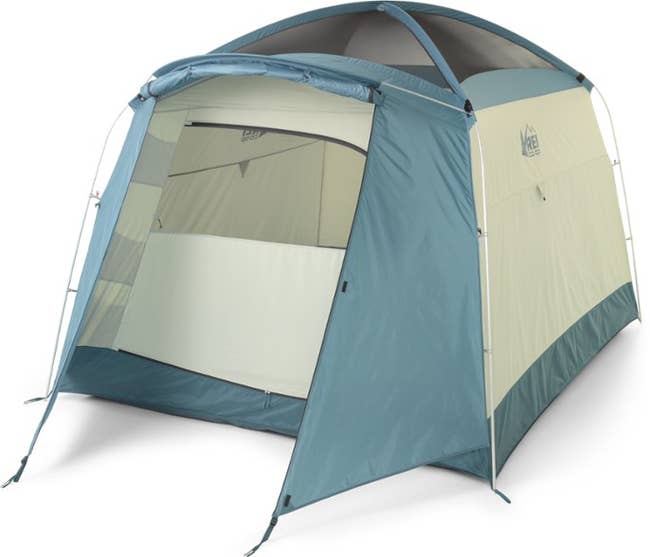a standing blue and tan six-person tent