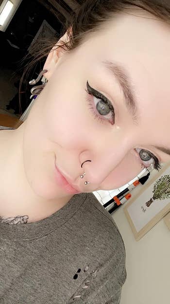 reviewer wearing eyeliner with wing
