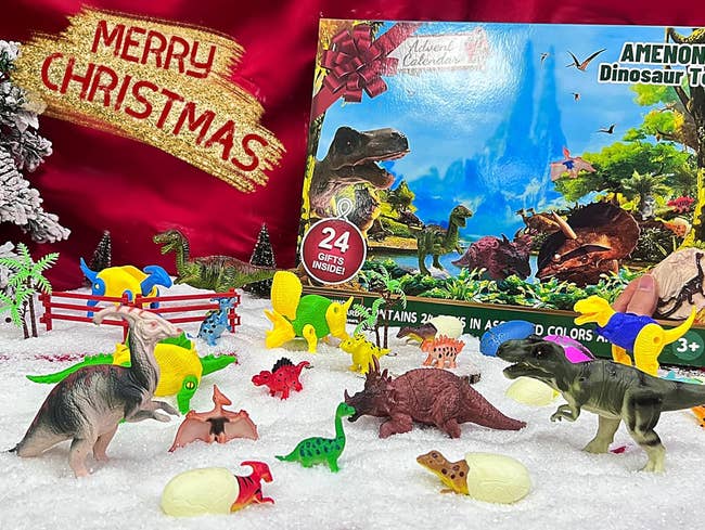 an array of toy dinosaurs from an advent calendar
