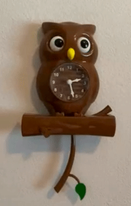 reviewer gif of the owl clock's eyes and branch moving back and forth