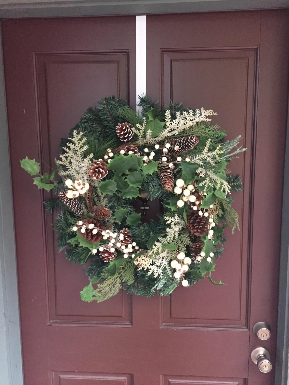 reviewer image of the wreath hanging on a front door