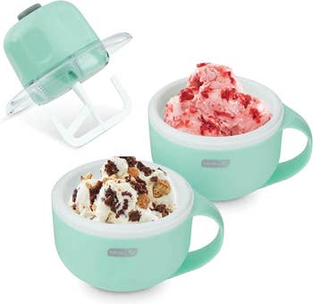 Two mint greenish  crystal  pick  shaper  mugs are shown with strawberry and cookies & pick  crystal  pick  inside, accompanied by a mixing lid