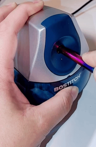 reviewer's gif showing how the pencil sharpener works