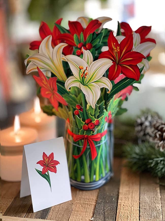 christmas-y bouquet of white and red lilies