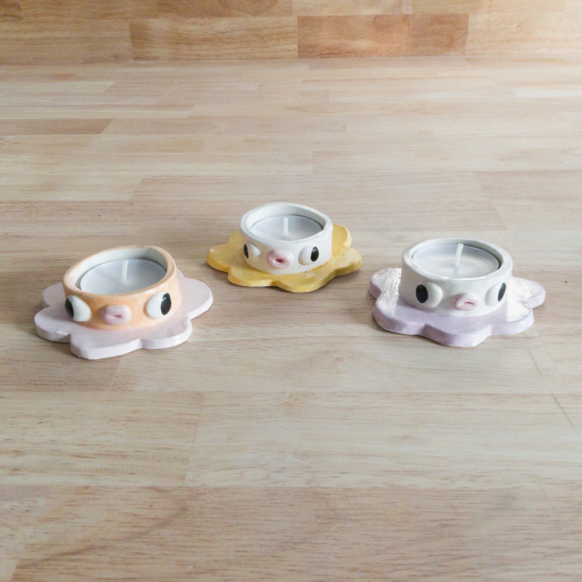 clay flower candle holders with silly faces