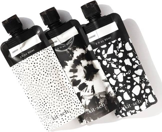 three black and white kitsch travel toiletry pouches
