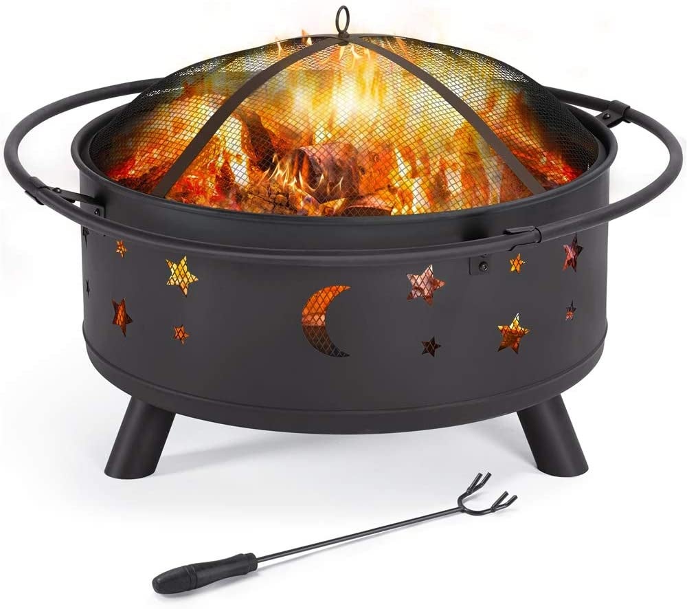 fire pit with stars and moon design on the side