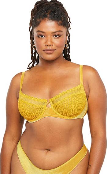 a model wearing the bra in yellow
