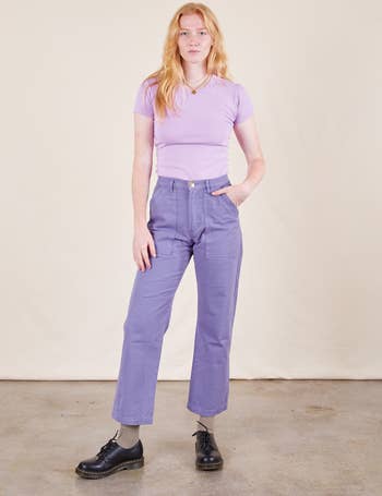 Model wearing grape colored pants 