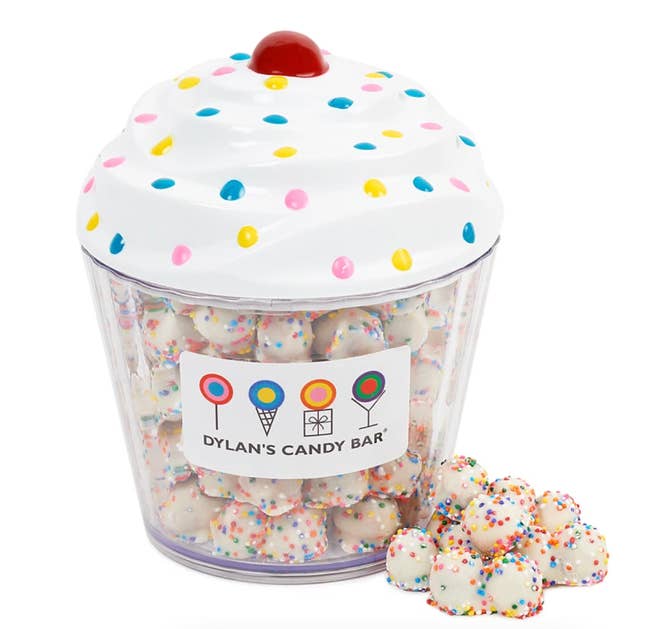 Cupcake shaped container with treats inside 