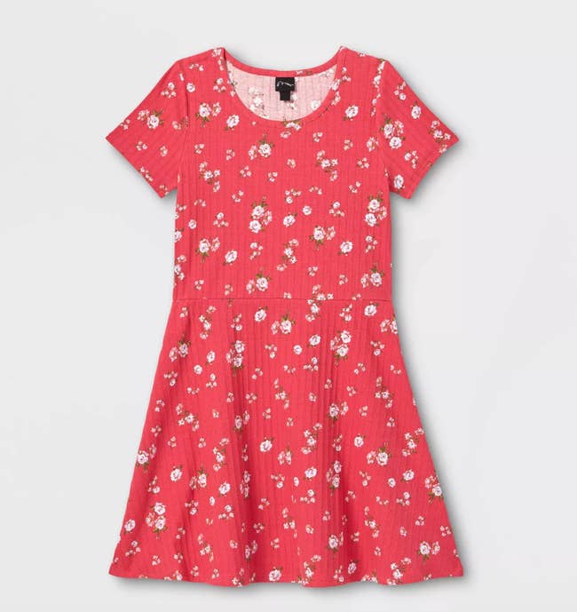 a red skater dress with small flowers on it