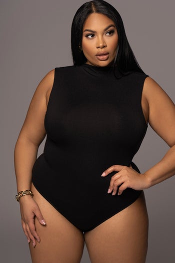 front view of a model wearing the bodysuit in black