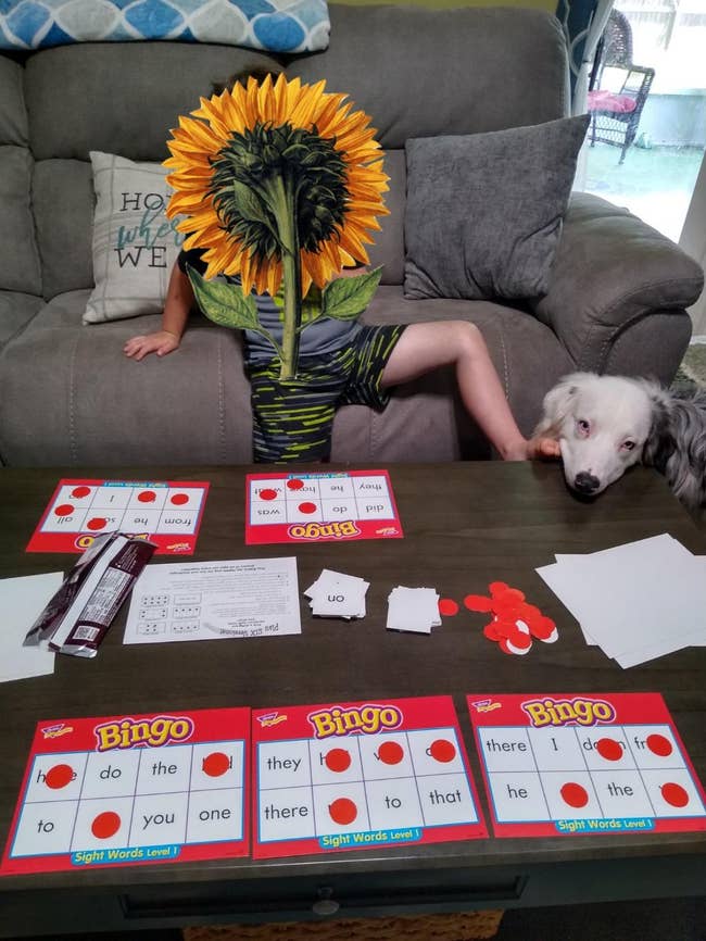 reviewer and their child playing bingo game