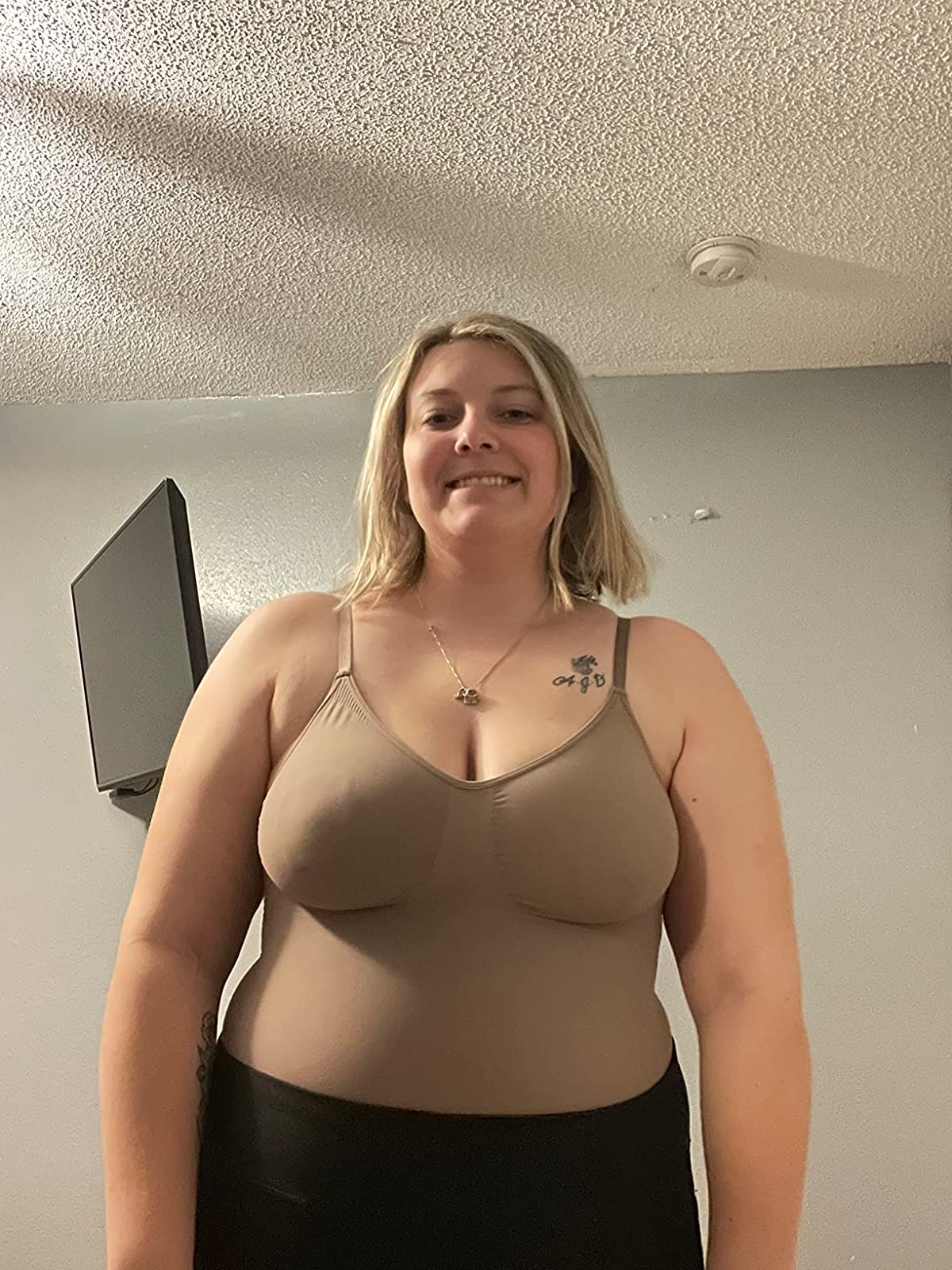 reviewer wearing the body suit