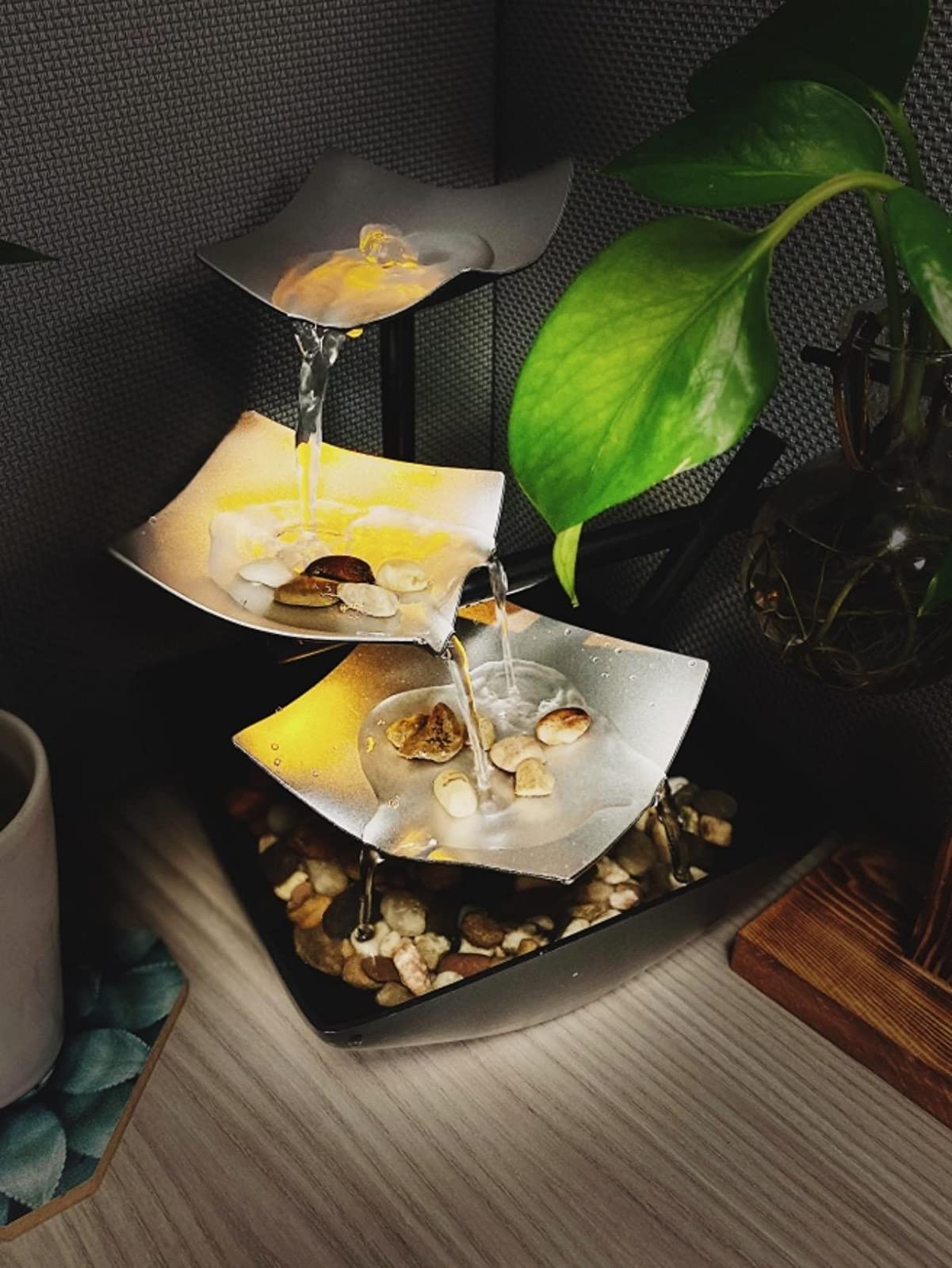 Reviewer representation  of the 3  tiered tiny  waterfall with metallic  plates