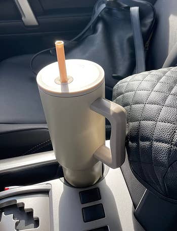 the simple modern tumblr in a reviewer's car drink holder
