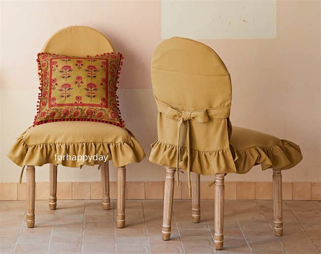 chair with khaki slipcover from front and side angle displaying ruffles and tie-back closure
