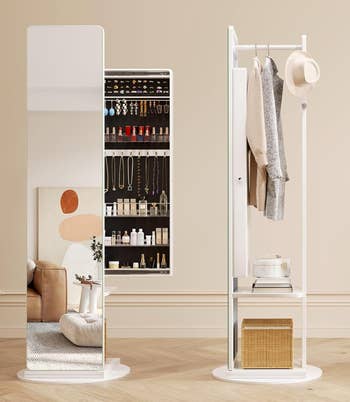 A mirrored cabinet open to display jewelry and skincare products next to a wardrobe stand with coats and a hat