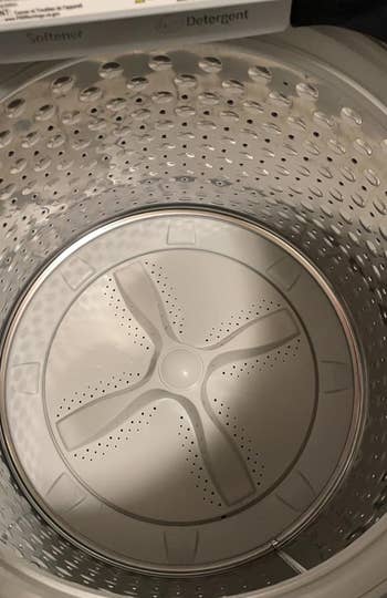 same reviewer showing inside of their clean washer drum