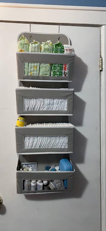 the over-the-door shelves with baby supplies in it