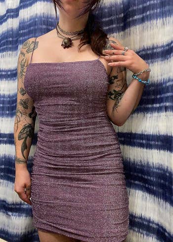 reviewer wearing formal  successful  purple