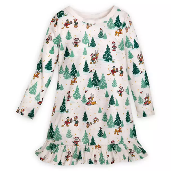 a cream colored pajama dress for children with wintry trees and disney characters on them