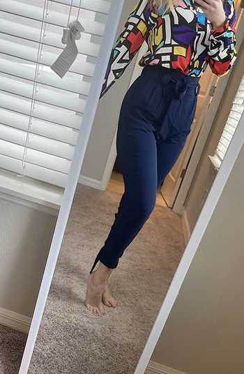 Image of reviewer wearing navy pants
