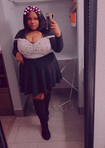 a reviewer wearing the skirt in black