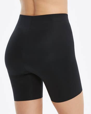 model wearing black bottom boosting underwear